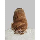A voluminous shoulder-length wavy human hair wig in warm honey blonde with subtle darker roots and 13x6 transparent lace front