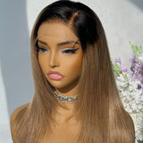 A long straight two-toned human hair wig with 5x5 transparent lace front preplucked ombre color and layered style