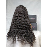 Black voluminous curly human hair wig with lace upgraded hairline and natural shine in burmese curly style