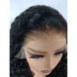 Black curly human hair wig with lace front and natural parting featuring an upgraded lace upgraded hairline