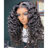 Black voluminous curly human hair wig with transparent lace front and bouncy loose wave parting, 150 180 250 density