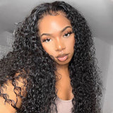 Black voluminous curly wave human hair extensions with transparent lace front and pre-plucked hairline for natural look