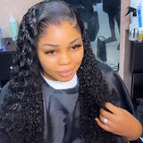 Black voluminous curly water wave hair extensions with natural part and glossy texture in lagos 13x6 hd lace wig
