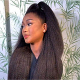 A woman wearing lagos kinky straight 13x6 hd lace front wig styled in a sleek black high ponytail with m-shaped hairline